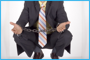Online Mall image of a man in his haunches and chain shacles on his hands as it to ask, Why buy online?